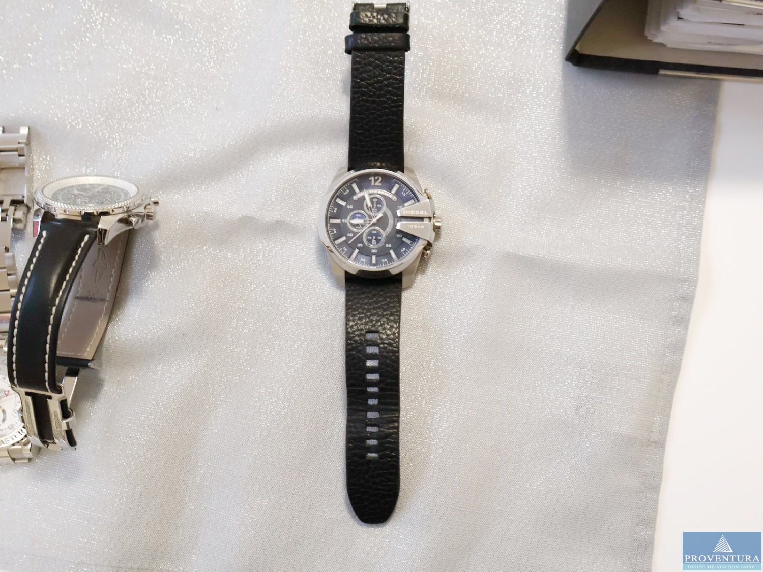 Insolvenzversteigerung 2 Armbanduhren Chronograph DIESEL only the brave, RETROCHRON Timenavigator Chronograph 61-55-1