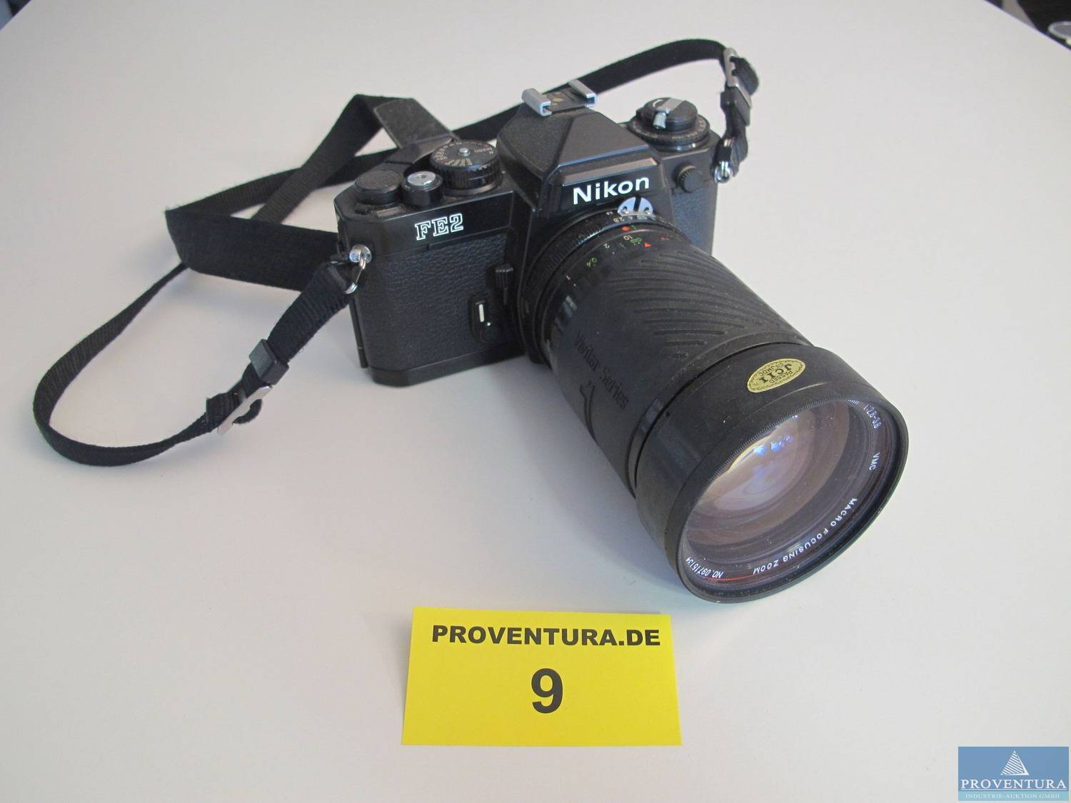 Armbanduhren BREITLING und Kameras NIKON